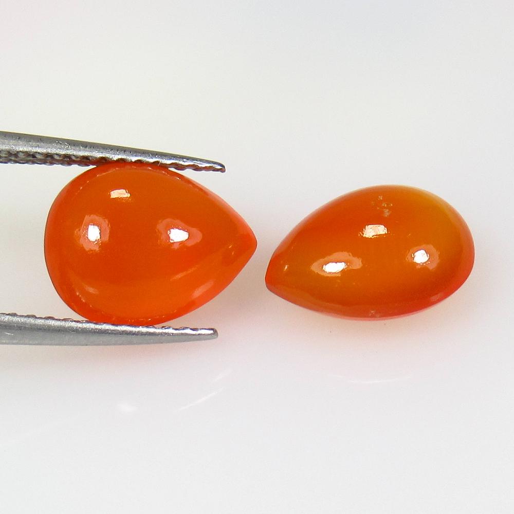 5.17 Ct Natural Orange Carnelian Pear Pair: No Reserve! Title: 5.17 Ct Natural Orange Carnelian Pear Pair Stone Clarity: Semi-Transparent Gemstone: Natural Carnelian Carat Weight: 5.17 Size/Dimensions: 10.20 x 7.50 x 5.00 mm / 2 Pc's Additional