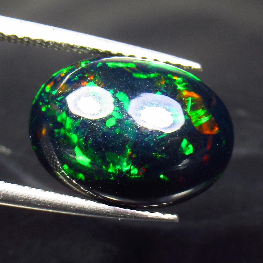 4.07 Ct Natural Ethiopian Black Fire Opal Oval Cab (1 of 3)
