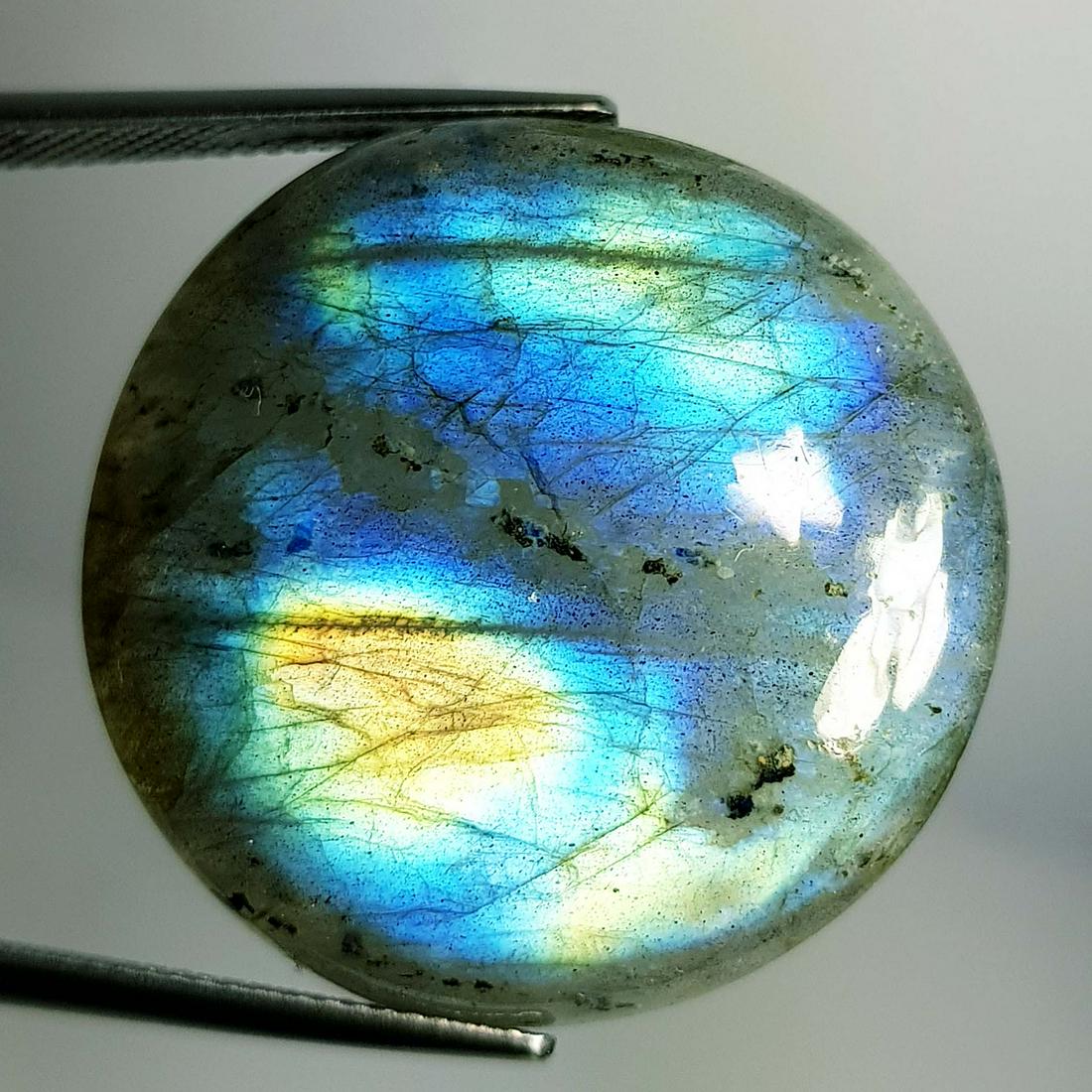 48.49 Ct Natural Labradorite: No Reserve! Title: 48.49 Ct Natural Labradorite Color/Clarity: Opaque Gemstones: LooseGemstone Carat Weights: 48.49 Size/Dimensions: 34.00 x 34.00 x 11.95 Additional Information: Round - USA Shipping: