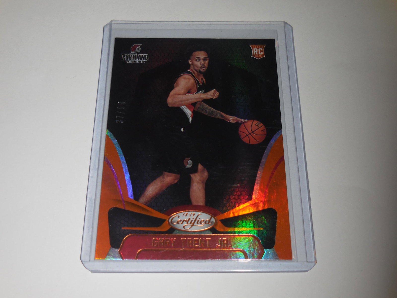 18-19 PANINI CERTIFIED GARY TRENT JR ROOKIE CARD #'D: No Reserve! Title: 18-19 PANINI CERTIFIED GARY TRENT JR ROOKIE CARD #'D 37/99 Description: THIS IS A VERY NICE CARD FOR ANY COLLECTOR. APPROXIMATELY NEAR MINT CONDITION OR BETTER. COMES WITH SLEEVE AN