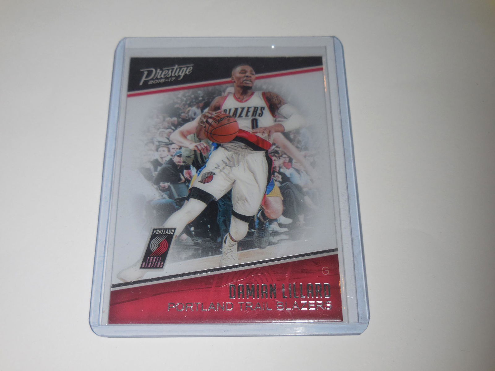 16-17 PRESTIGE DAMIAN LILLARD ACETATE CARD (1 of 2)