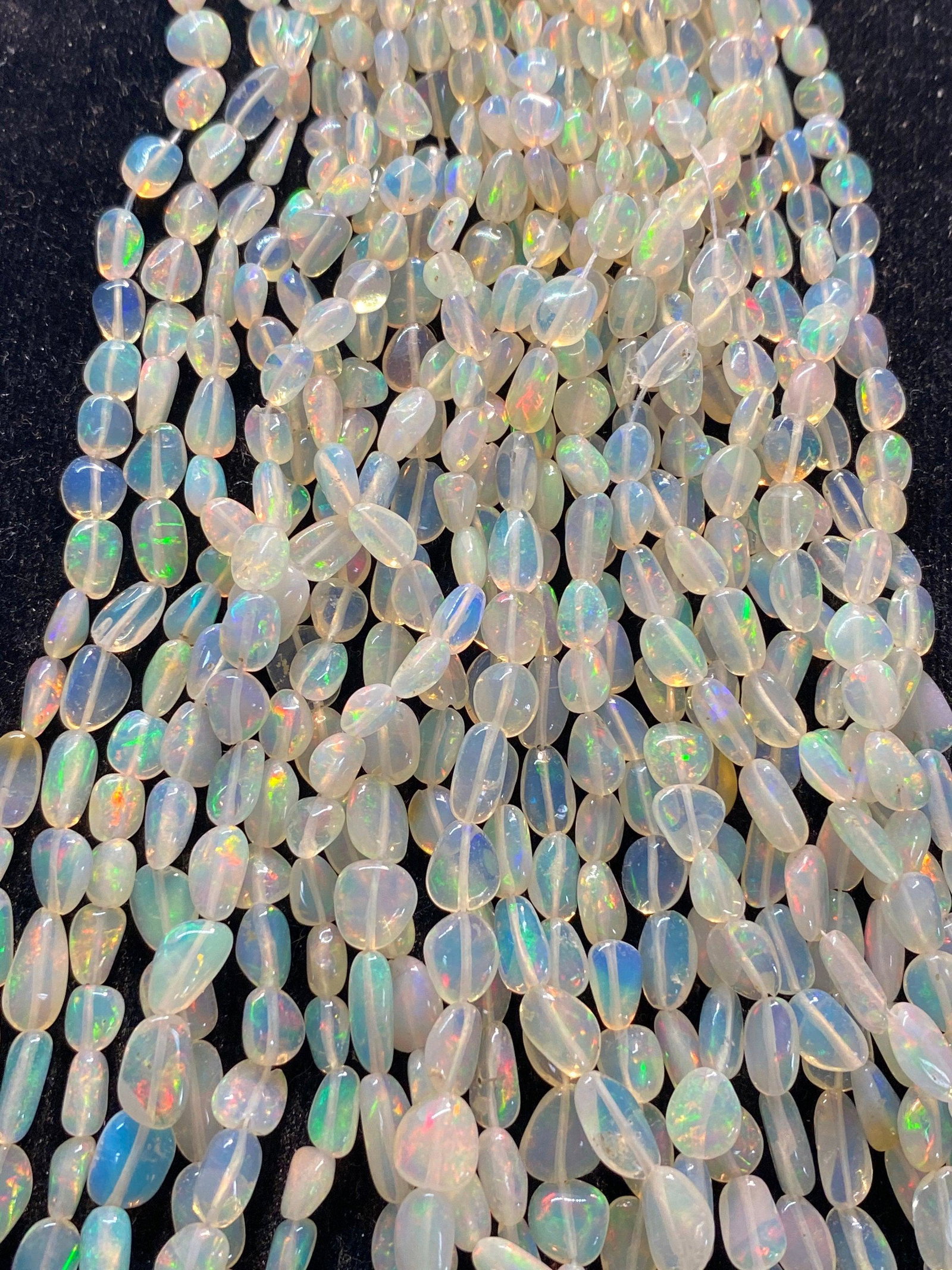 AAA Grade opal 4x11 mm 16'' Natural Rainbow Opal beads: The price is par strand gemstone : Opal Size: 4 x-11 mm shape: nuggets Strand Length: 16 inch ( 42 cm) Hole : 0,5 Ethiopian Welo Opal measures approx 4 x 8mm, The Strands has wonderful luster with exc