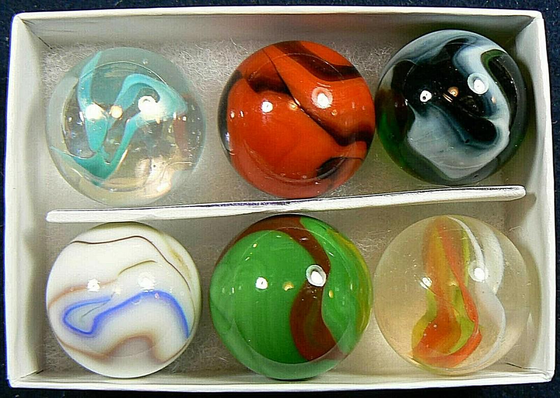 FS Peltier marble box set of 6 limited edition 1 inch: Title: FS Peltier marble box set of 6 limited edition 1 inch Date/Period: 1970 Dimensions: 1 inch Material: Glass Description: Colorful marble box set of 6 limited edition.This is a limited set and on