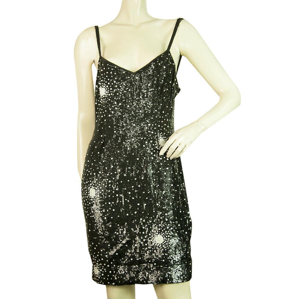 Escada by Margaretha Ley Black & White Sparkles Fully: Escada by Margaretha Ley Black & White Sparkles Fully Sequined Mini Length 38 This eye- catcher dress by Escada, is a mini length dress that it is fully covered by sequins in black and white with thin