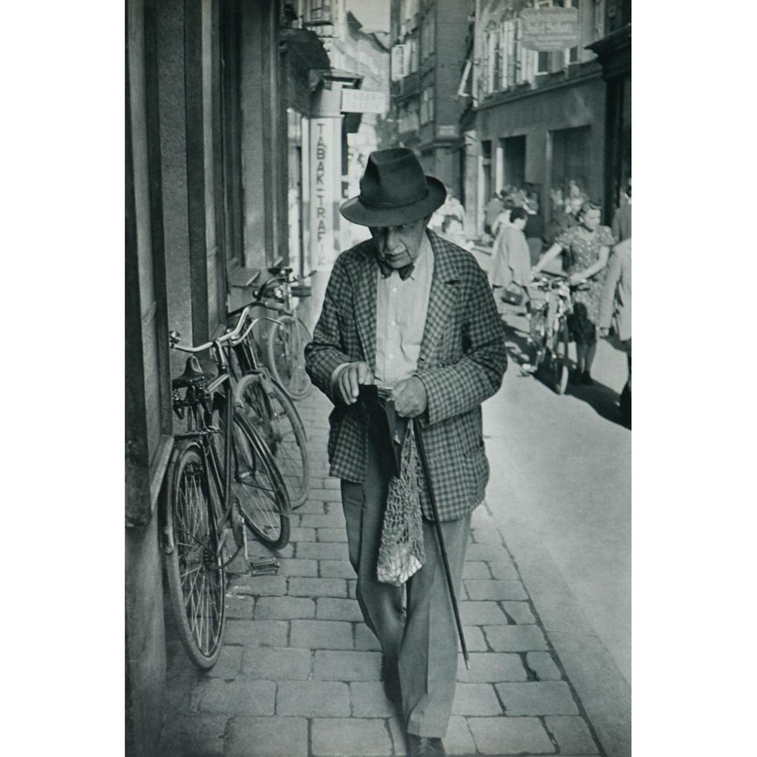 HENRI CARTIER-BRESSON - Salzburg, Austria - Original: Artist: HENRI CARTIER-BRESSON Print Title: Salzburg, Austria In the Getreidasse. Medium: Sheet-fed Gravure Printing Date: 1950's Printed in France Image Size approx: 13.5 x 9 inches Henri Cartier-Bres
