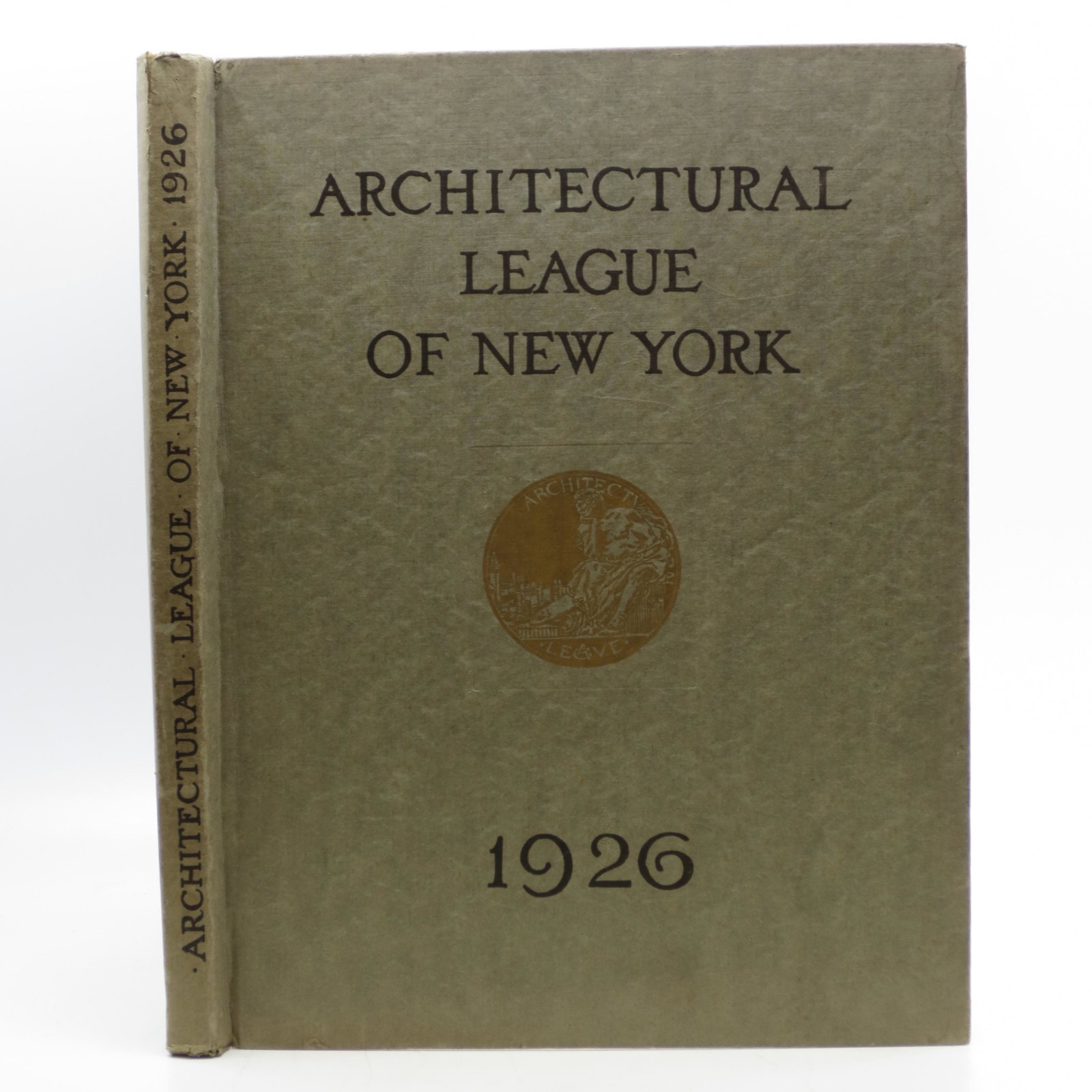 Year Book of the Architectural League of New York and: SKU #: 23550 Gray paper-covered boards with black lettering and gold seal on front cover, previous owner's stamp on front free end-paper, frontispiece, illustrated, not paginated, no writing in the bo