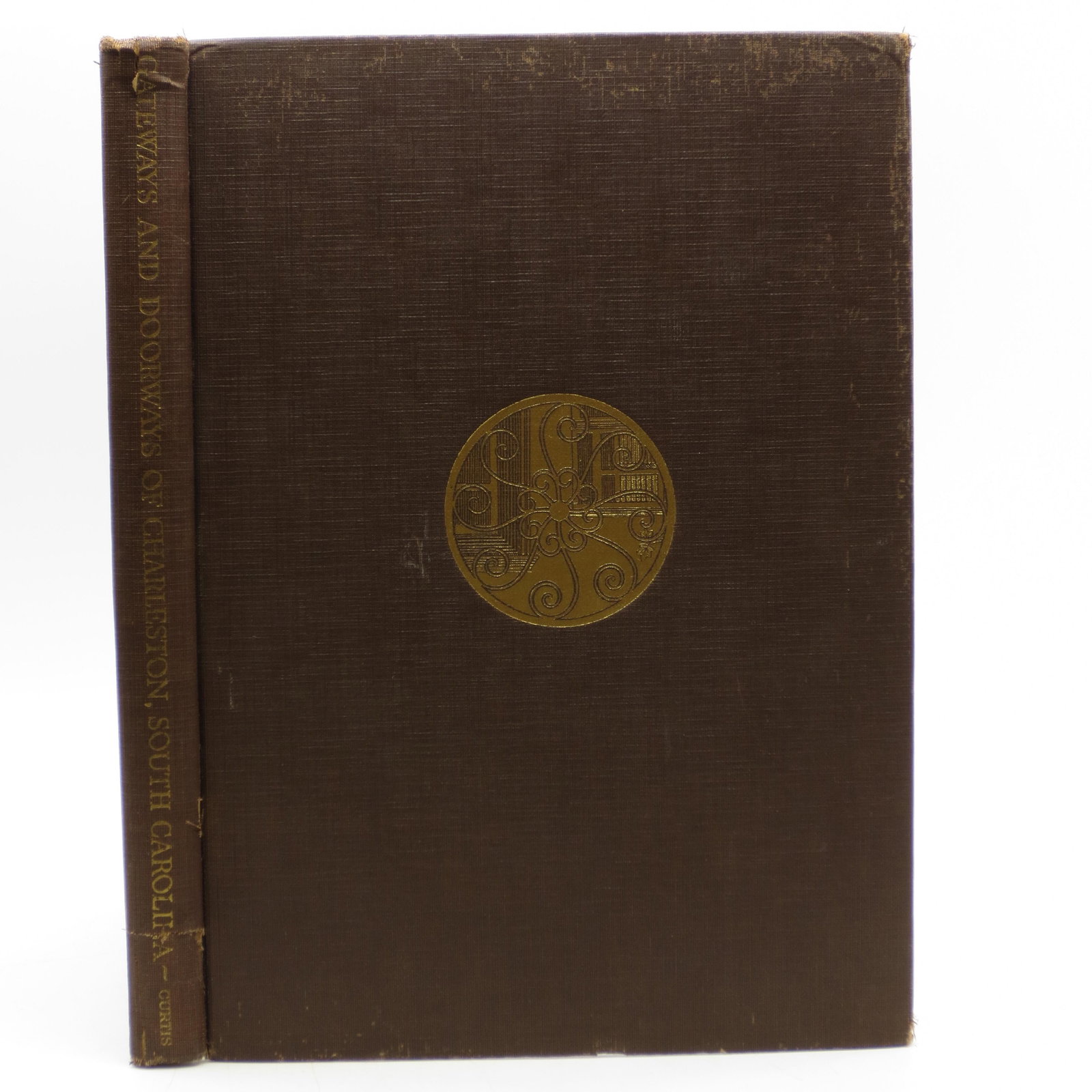 Gateways and Doorways of Charleston, South Carolina, in: SKU #: 30908 Edited with Introduction and Notes by Maxwell Kimball, A.I.A. and Arthur HC. Holden, A.I.A. Brown cloth with gold lettering and design on spine and front cover. Bottom 4" of front gutter 