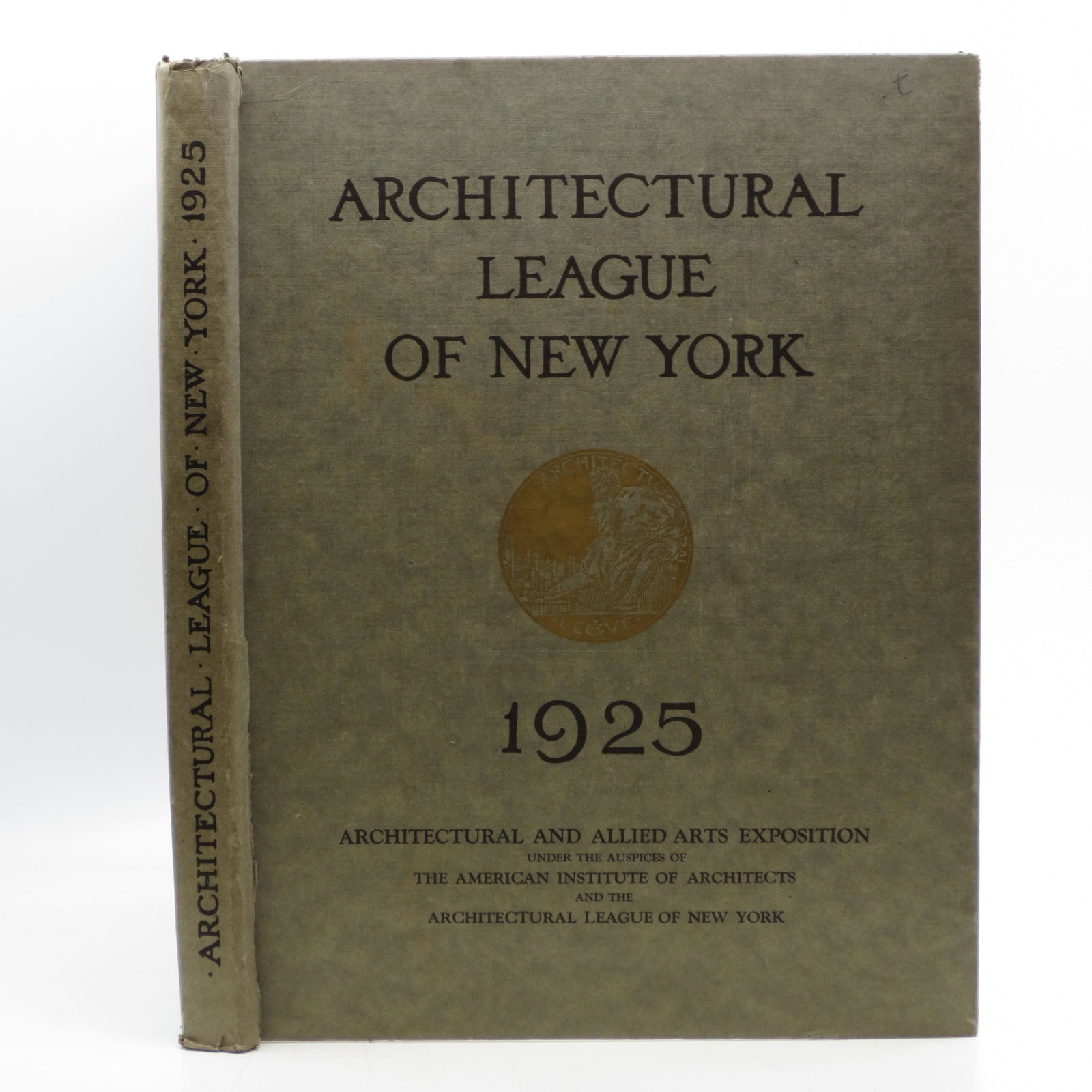 Year Book of the Architectural League of New York and: SKU #: 23552 Gray paper-covered boards with black lettering and gold seal on front cover, previous owner's signature on front free end-paper, color frontispiece, illustrated, not paginated, no writing