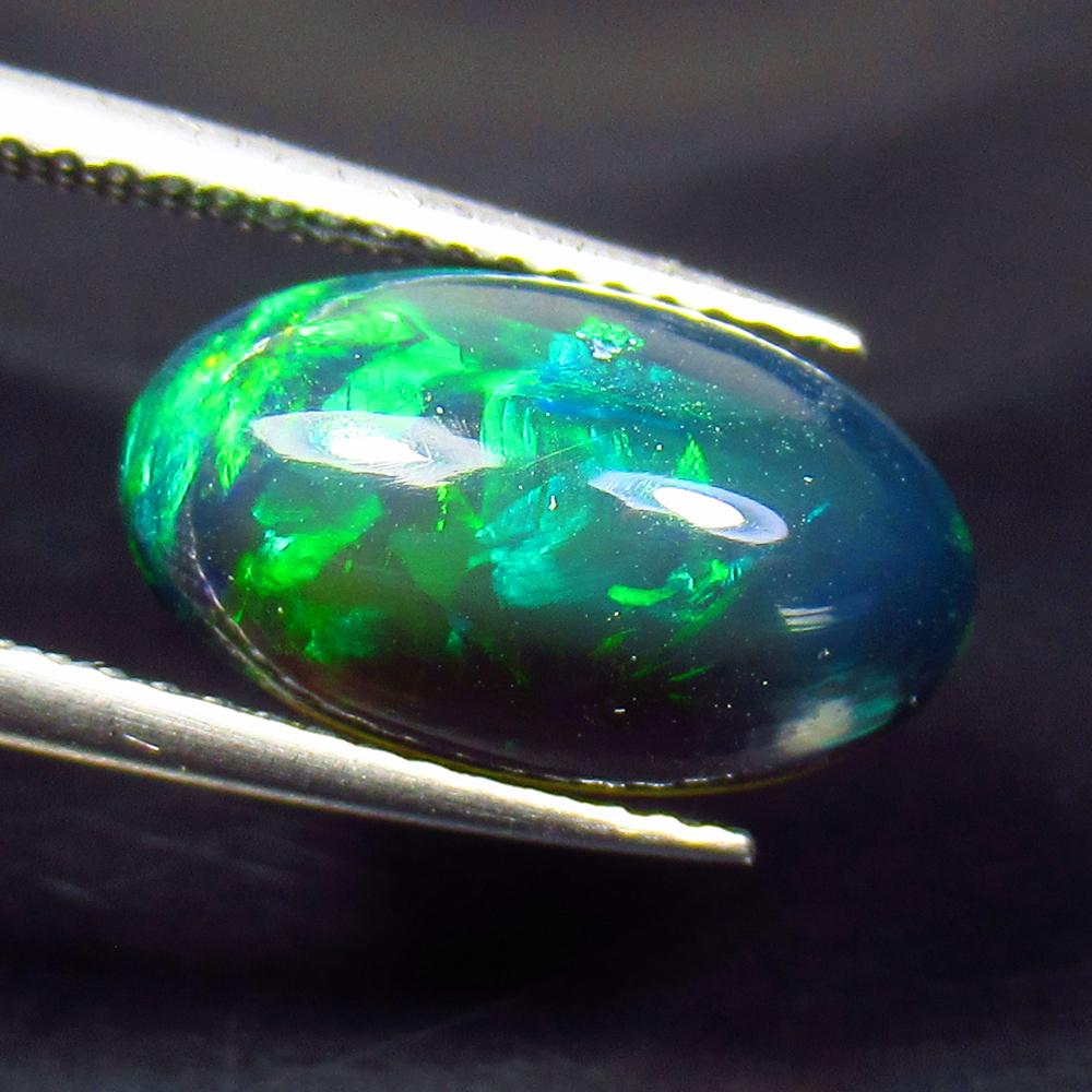 3.13 Ctw Natural Ethiopian Black Fire Opal Oval Cab: No Reserve! Title: 3.13 Ctw Natural Ethiopian Black Fire Opal Oval Cab Stone Clarity: Translucent Gemstones: Black Opal Carat Weights: 3.13 Size/Dimensions: 13.90 x 8.10 x 5.70 mm Additional Informati