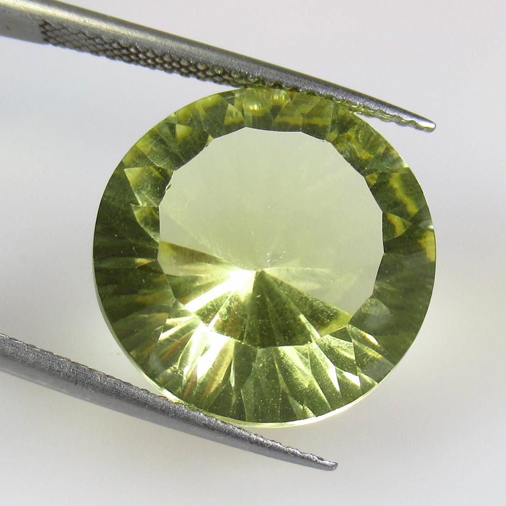 14.45 Ctw Natural Lemon Quartz Concave Cut: No Reserve! Title: 14.45 Ctw Natural Lemon Quartz Concave Cut Stone Clarity: VVS Gemstones: Lemon Quartz Carat Weights: 14.45 Size/Dimensions: 16.50 x 16.50 x 10.20 mm Additional Information: Good Lus