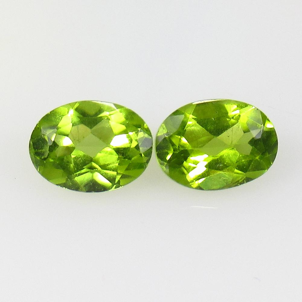 2.60 Ctw Natural Pakistan Peridot Oval Pair: No Reserve! Title: 2.60 Ctw Natural Pakistan Peridot Oval Pair Stone Clarity: VVS Gemstones: Peridot Carat Weights: 2.6 Size/Dimensions: 7.90 x 5.80 x 3.80 mm / 2 PC's Additional Information: Top Clas