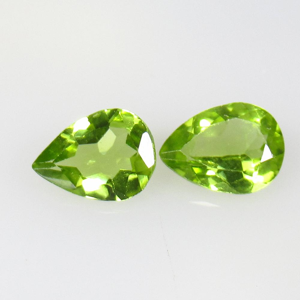 1.83 Ctw Natural Pakistan Peridot Pear Pair: No Reserve! Title: 1.83 Ctw Natural Pakistan Peridot Pear Pair Stone Clarity: VVS Gemstones: Peridot Carat Weights: 1.83 Size/Dimensions: 8.00 x 6.00 x 3.00 mm / 2 Pc's Additional Information: Top Cla