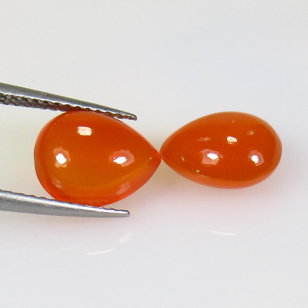 5.36 Ctw Natural Orange Carnelian Pear Pair: No Reserve! Title: 5.36 Ctw Natural Orange Carnelian Pear Pair Stone Clarity: Semi-Transparent Gemstones: Carnelian Carat Weights: 5.36 Size/Dimensions: 10.30 x 8.30 x 5.20 mm / 2 PC's Additional Info