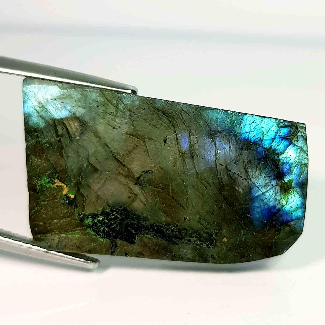 29.15 Ct Natural Labradorite Slice: No Reserve! Title: 29.15 Ct Natural Labradorite Slice Color/Clarity: Opaque Gemstones: LooseGemstone Carat Weights: 29.15 Size/Dimensions: 28.00 x 16.40 x 5.20 Additional Information: Fancy - USA Ship