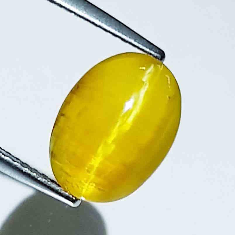 4.78 ct Natural Opal Cat's Eye: No Reserve! Title: 4.78 ct Natural Opal Cat's Eye Color/Clarity: Semi Transparent Gemstones: Loosegemstone Carat Weights: 4.78 Size/Dimensions: 12.50 x 9.20 x 7.50 Additional Information: Oval - Afric