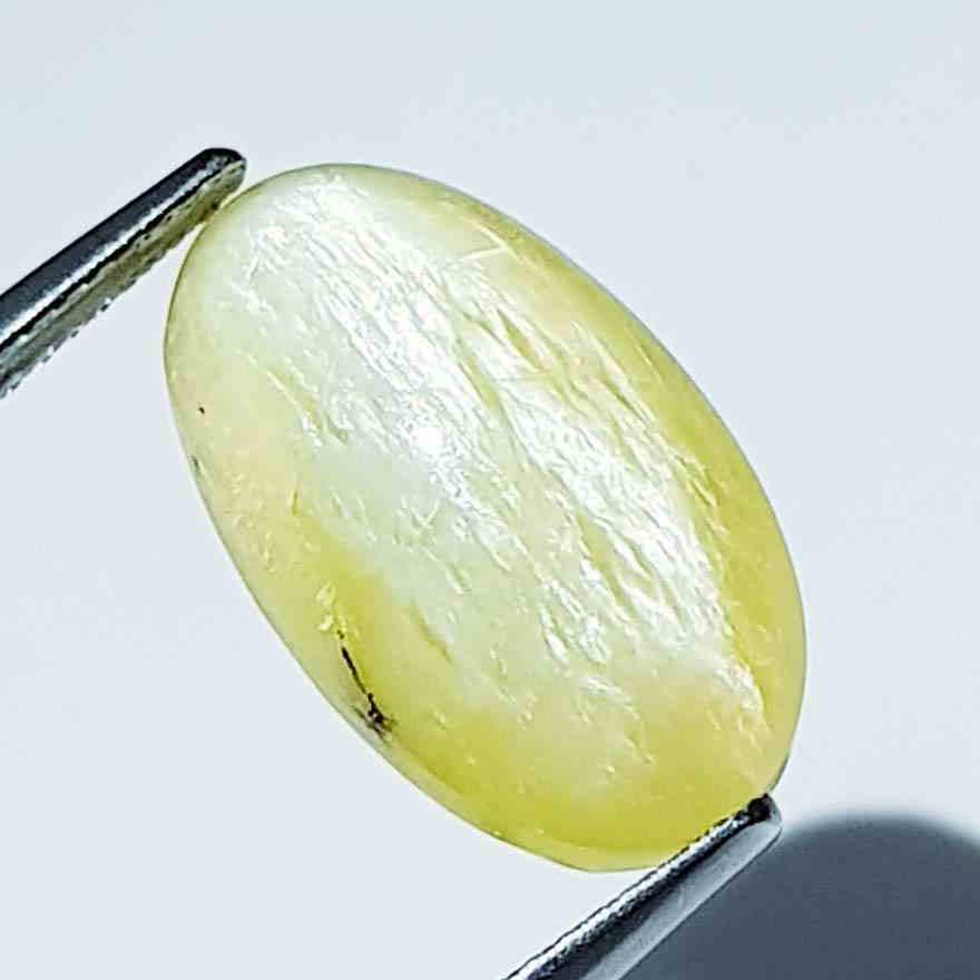 9.99 ct Natural Opal Cat's Eye: No Reserve! Title: 9.99 ct Natural Opal Cat's Eye Color/Clarity: Semi Transparent Gemstones: Loosegemstone Carat Weights: 9.99 Size/Dimensions: 16.80 x 10.00 x 9.70 Additional Information: Oval - Afri