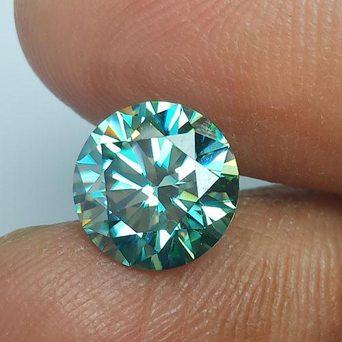 2.47 CTS NATURAL GREEN MOISSANITE ROUND SHAPE GOOD: Title: 2.47 CTS NATURAL GREEN MOISSANITE ROUND SHAPE GOOD LUSTER LOOSE GEMSTONES Carat Weights: 2.47 Size/Dimensions: 8.7 MM Provenance/Additional Info:DIAMOND LUSTER Reserve: $35.00 Shipping: Domesti