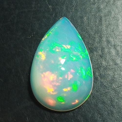 3.65 Cts Marvelous Luster! Natural Ethiopian Welo Opal: Title: 3.65 Cts Marvelous Luster! Natural Ethiopian Welo Opal Pear Loose Gemstone Carat Weights: 3.65 Size/Dimensions: 14.6 x 9.7 x 6.0 MM Reserve: $35.00 Shipping: Domestic: Flat-rate of $10.00 to an
