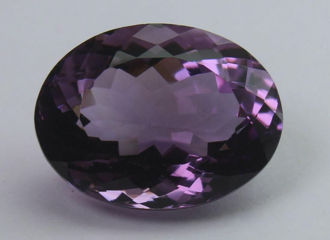 9.71 Cts Natural Amethyst: No Reserve! Gemstone : Natural Amethyst Origin: Brazil Weight: 9.71 carats Dimensions: 16x12.2x8.6 mm Shape/Cut: Oval Cut Colour: Purple Transparency: Transparent Treatment: none Shipping: Domes