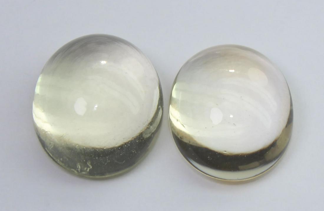 7.49 Cts Natural Lemon Quartz Lot: No Reserve! Gemstone : Natural Lemon Quartz Weight : 7.49 Carats Dimensions : 11.7x10.7x5.7 mm , 11.6x9.5x5 mm Shape : Oval Cabochon Colour : Light Yellow Number of Stone : 2 Origin : Africa Transpare
