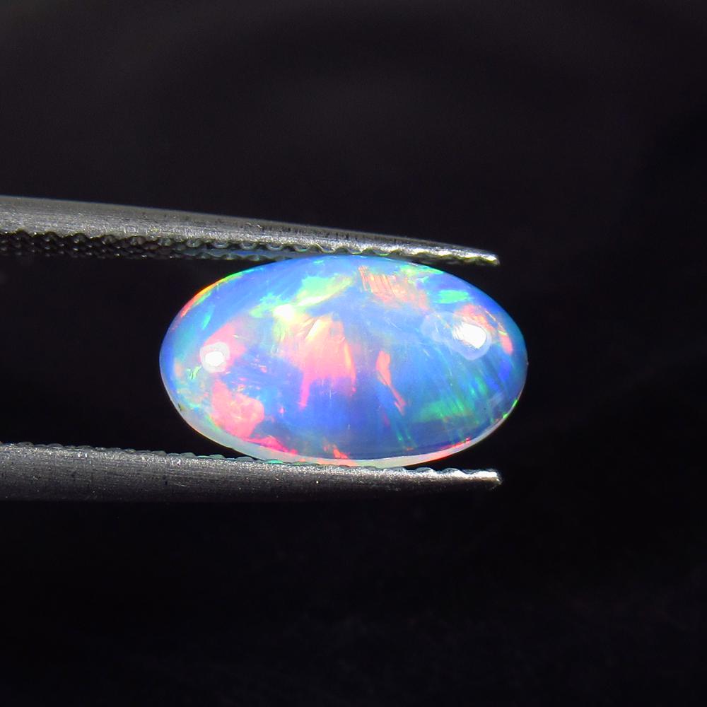 1.25 Ct Natural Ethiopian Multicolor Opal Oval Cab (1 of 2)