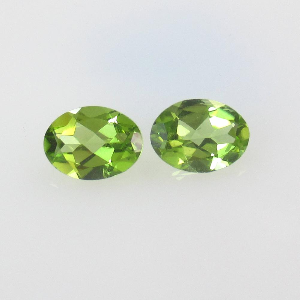 2.10 Ct Natural Pakistan Peridot Oval Pair: No Reserve! Title: 2.10 Ct Natural Pakistan Peridot Oval Pair Stone Clarity: VVS Gemstone: Natural Peridot Carat Weights: 2.10 Size/Dimensions: 8.00 x 6.00 x 3.30 mm / 2 PC's Additional Information: T