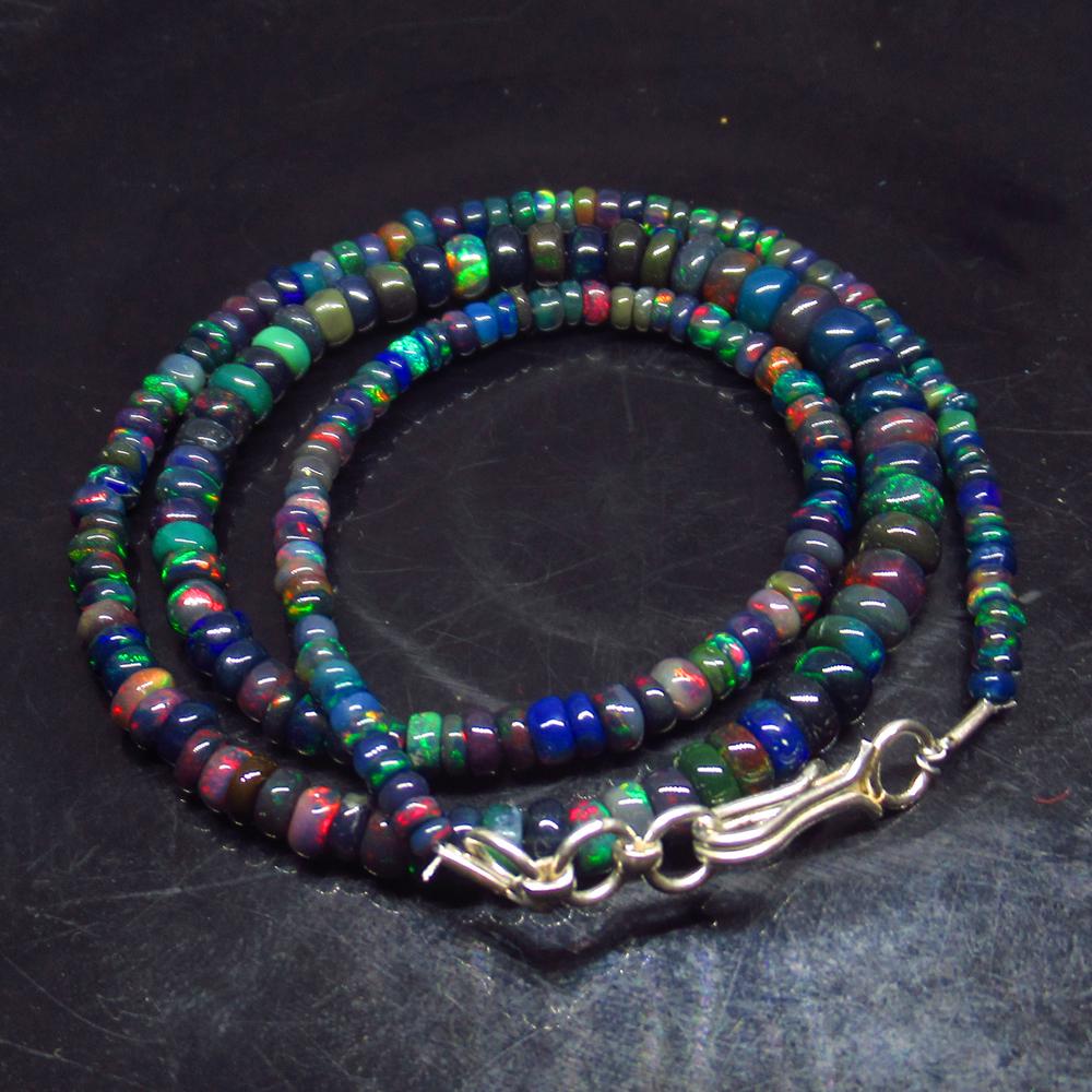 40.00 Ctw 925 Silver 200 Black Fire Opal Beads Necklace: No Reserve! Title: 40.00 Ctw 925 Silver 200 Black Fire Opal Beads Necklace Stone Clarity: Transsluent Gemstone: Black Opal Beads Carat Weight: 40 Size/Dimensions: 3.00 to 5.50 mm / 200 PC's / 18" inch