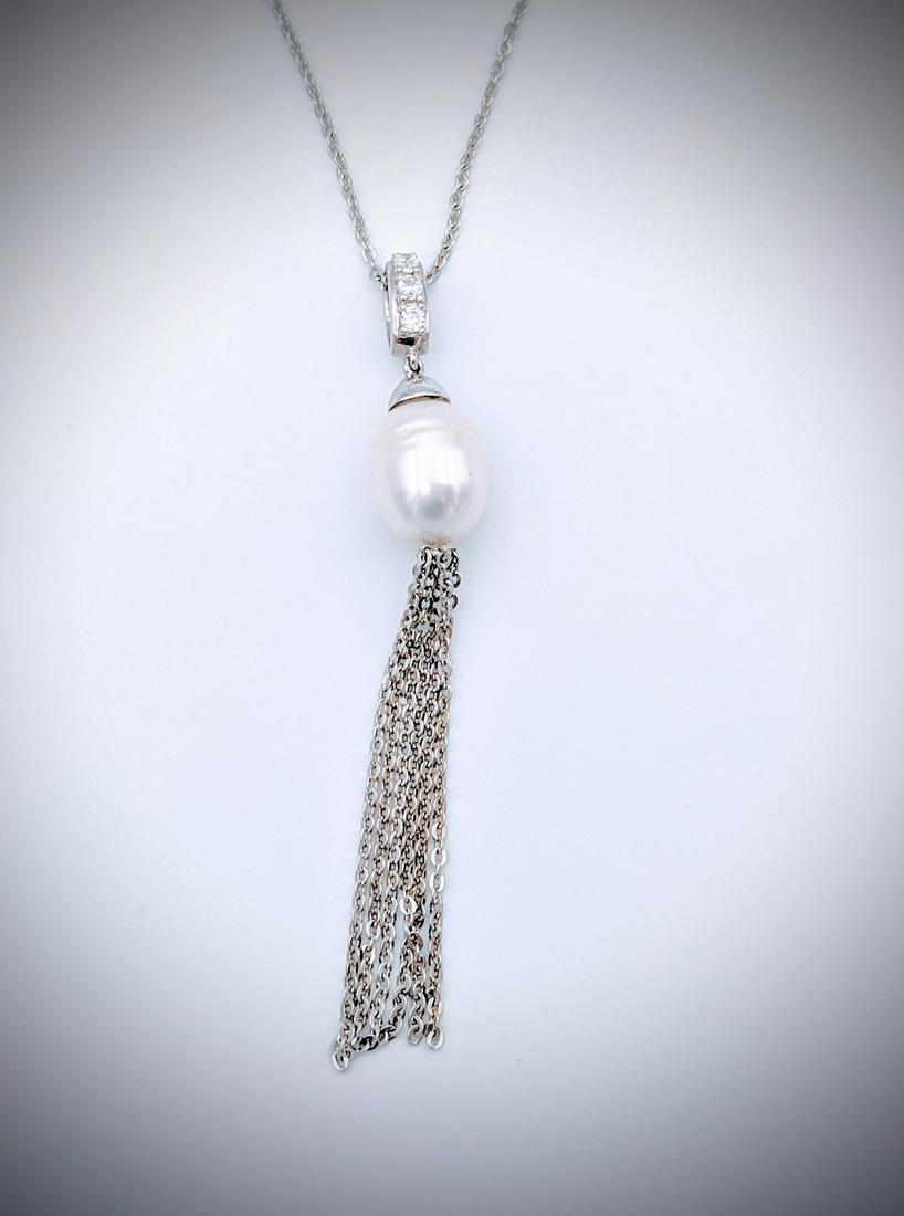 Sterling Silver Necklace w Pearl Drop Tassel Pendant: Title: Sterling Silver Necklace w Pearl Drop Tassel Pendant and CZs Brand: Jean Lin Collection Metal Purity: 925 Sterling Silver Gemstones: Pearl and Cubic Zirconia Carat Weights: Pendant has 1 Oval P