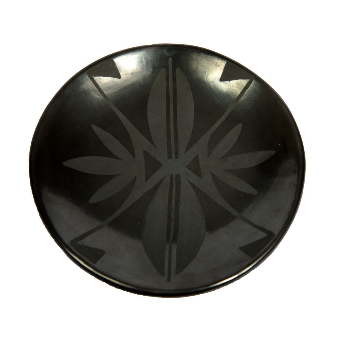San Ildefonso black-on-black plate with geometric: Title: San Ildefonso black-on-black plate with geometric decoration Description: San Ildefonso black-on-black plate with geometric decoration signed “Maria + Santana,” by Maria Poveka Martinez (18
