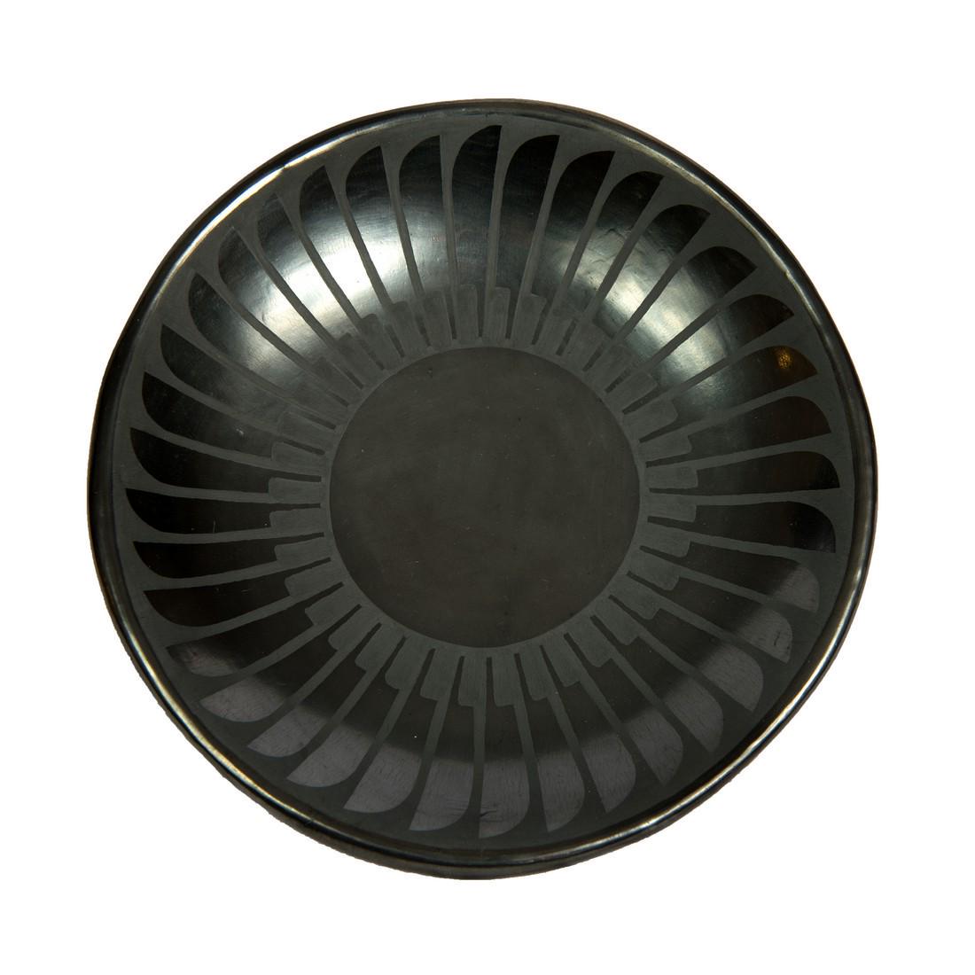 San Ildefonso black-on-black plate with feather: Title: San Ildefonso black-on-black plate with feather Description: San Ildefonso black-on-black plate with feather decoration signed “Maria/Popovi” by Maria Poveka Martinez (1887-1980) and Popovi