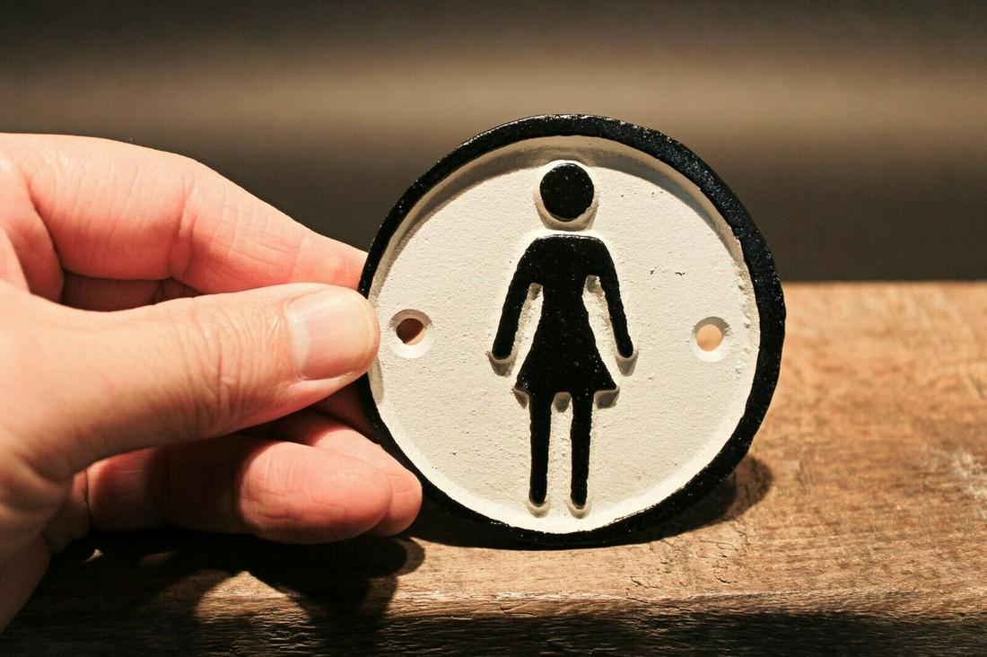 Cast Iron Bathroom Ladies Womens Plaque Retro Sign: 3" Wide 1/4" thick A wonderful reproduction cast iron " womens" sign. Hand painted black and white. As you can see in the images it has a slight distressed look that really makes it look like an actua