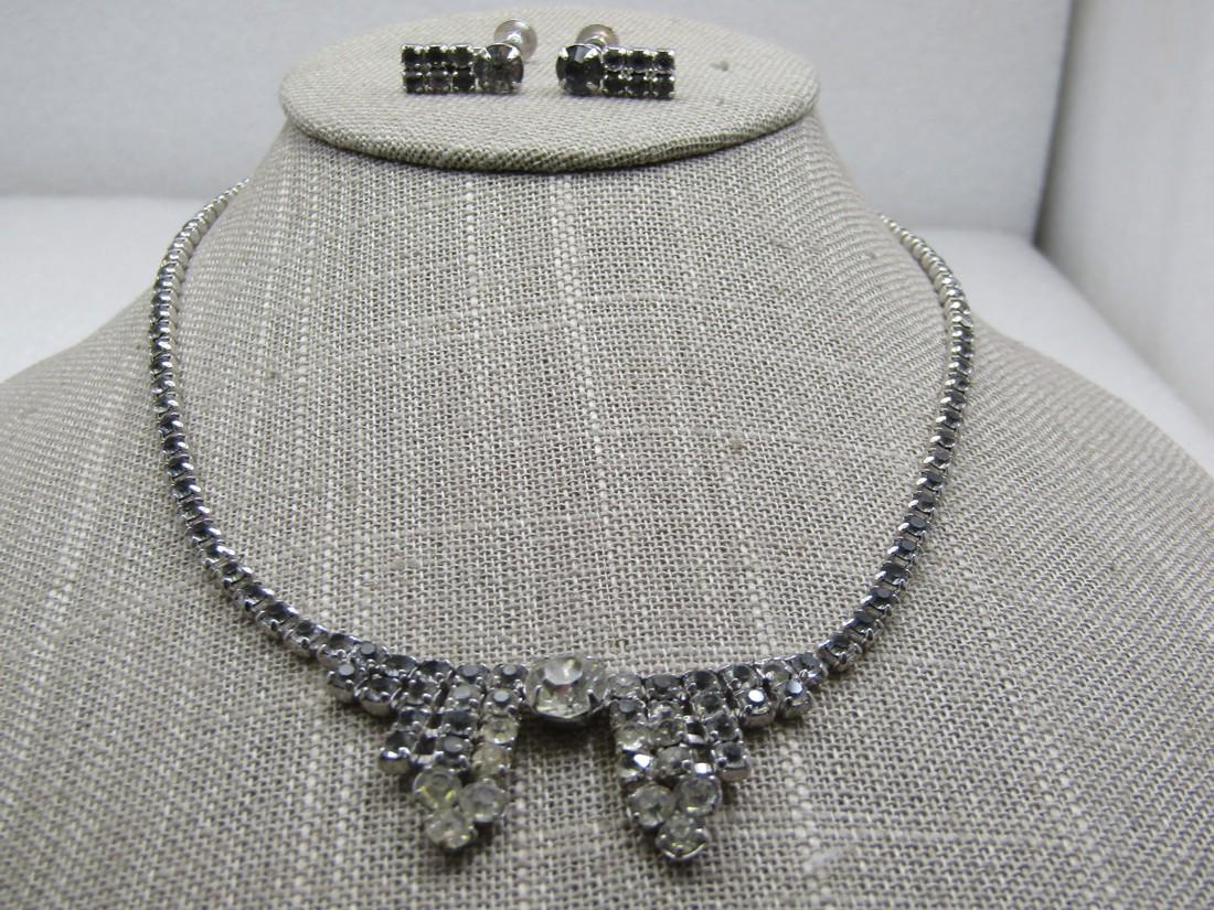 Vintage Art Deco Rhinestone Necklace & Earrings Set,: Vintage Art Deco Rhinestone Necklace & Earrings Set, 17", Screw Back earrings that are appx. 5/8" widethree rows of stones and a larger stone on top. Art dec design. Silver tone, some uneven coloring