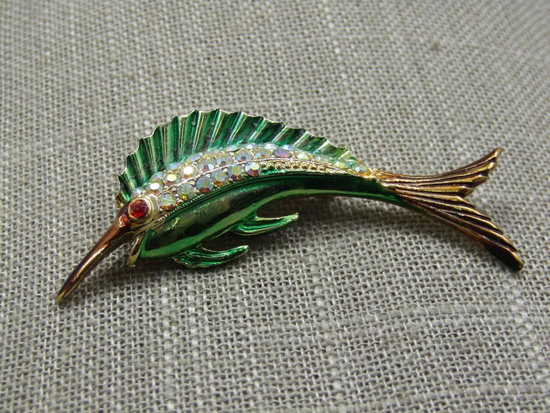 Vintage Rhinestone Marlin Fish Brooch, Enameled.,: Vintage Rhinestone Marlin Fish Brooch, Enameled., 1960's, 2.25" long and 7/8" tall. Arched fish with red eye, aurora borealis rhinestone eyes and green foil enameled fings and body rose gold mouth and