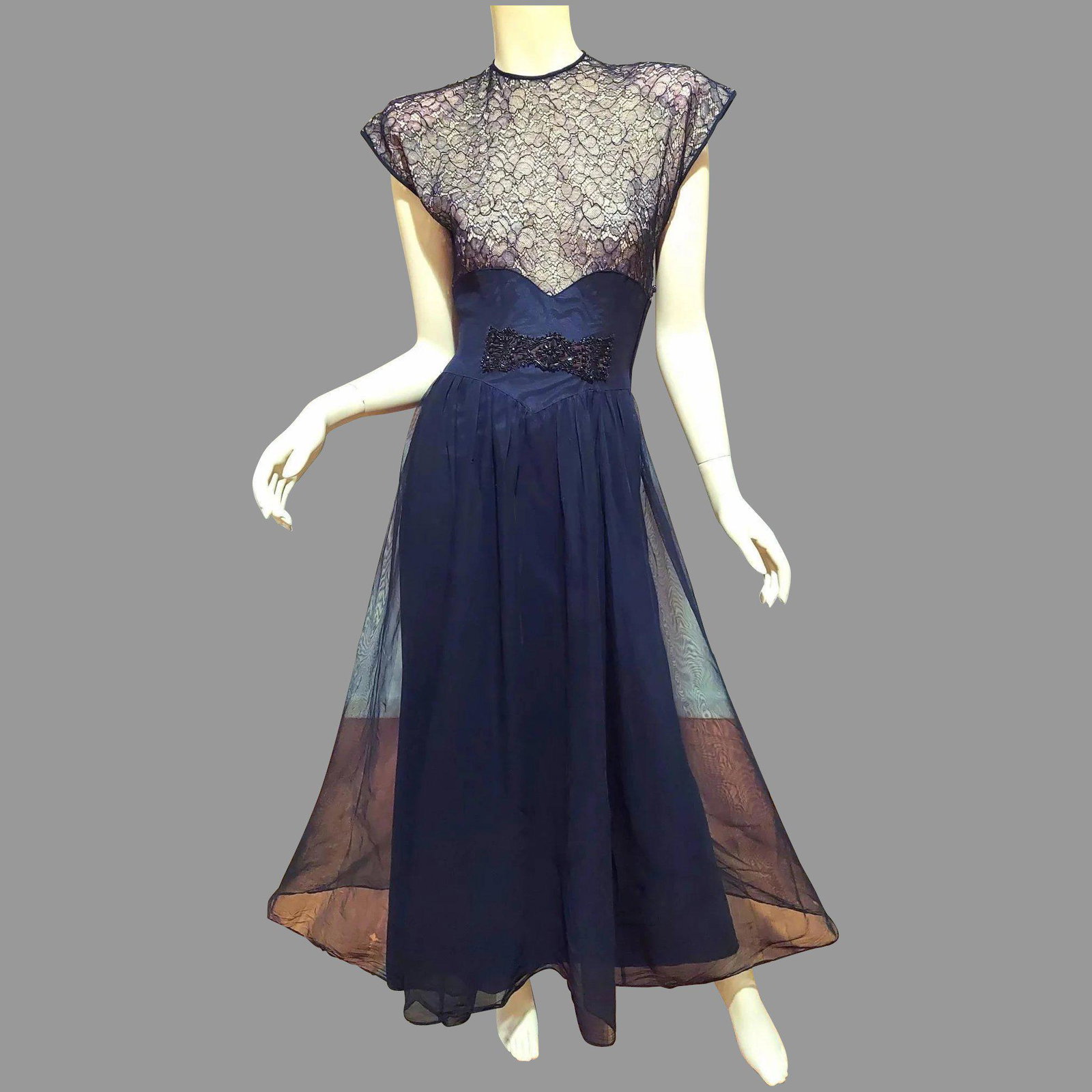 Vtg 1930's Hollywood Glam Chiffon Maxi dress Chantilly: Stunning Hollywood Glam Gown , Chantilly lace over Illusion beige. Skirt is Net over Taffeta midriff is adorned with beads in onyx. Skirt has spattered beads and sequins. Shoulder have large pads. In 
