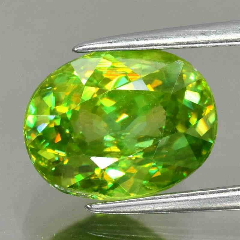 2,58 ct Natural Sphene (Rainbow Spark Under Sun Light!) (1 of 2)