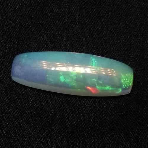 3.60 CTS NATURAL ETHIOPIAN WELO WHITE OPAL LONG CUSHION: Title: 3.60 CTS NATURAL ETHIOPIAN WELO WHITE OPAL LONG CUSHION GOOD LUSTER LOOSE GEMSTONES Carat Weights: 3.6 Size/Dimension: 20.3 x 6.9 x 4.7 MM Reserve: $30.00 Shipping: Domestic: Flat-rate of $10.0