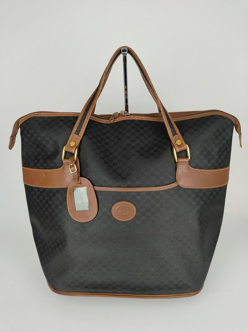 GUCCI  Borsa da viaggio in tela rivestita e pelle (1 of 12)