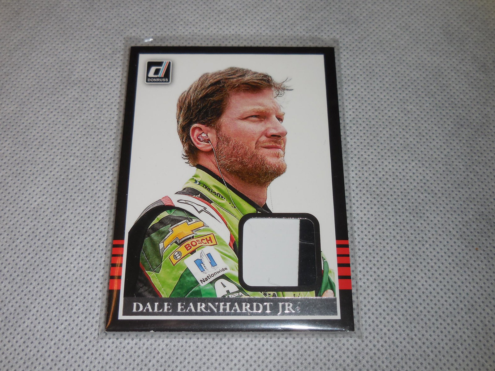 2018 DONRUSS DALE EARNHARDT JR RACE USED RELIC CARD: A VERY NICE CARD FOR ANY COLLECTOR! PLEASE SEE PHOTOS TO DETERMINE THE EXACT CONDITION OF THIS CARD BUT IN MY OPINION IT IS APPROXIMATELY NEAR MINT CONDITION OR BETTER. THE ACTUAL CARD IN THE PHOTOS I