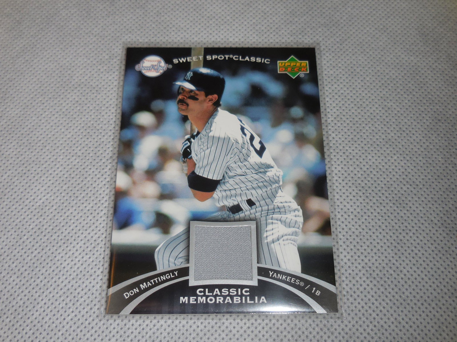 2007 UD SWEET SPOT DON MATTINGLY GAME WORN JERSEY: A VERY NICE CARD FOR ANY COLLECTOR! PLEASE SEE PHOTOS TO DETERMINE THE EXACT CONDITION OF THIS CARD BUT IN MY OPINION IT IS APPROXIMATELY NEAR MINT CONDITION OR BETTER. THE ACTUAL CARD IN THE PHOTOS I