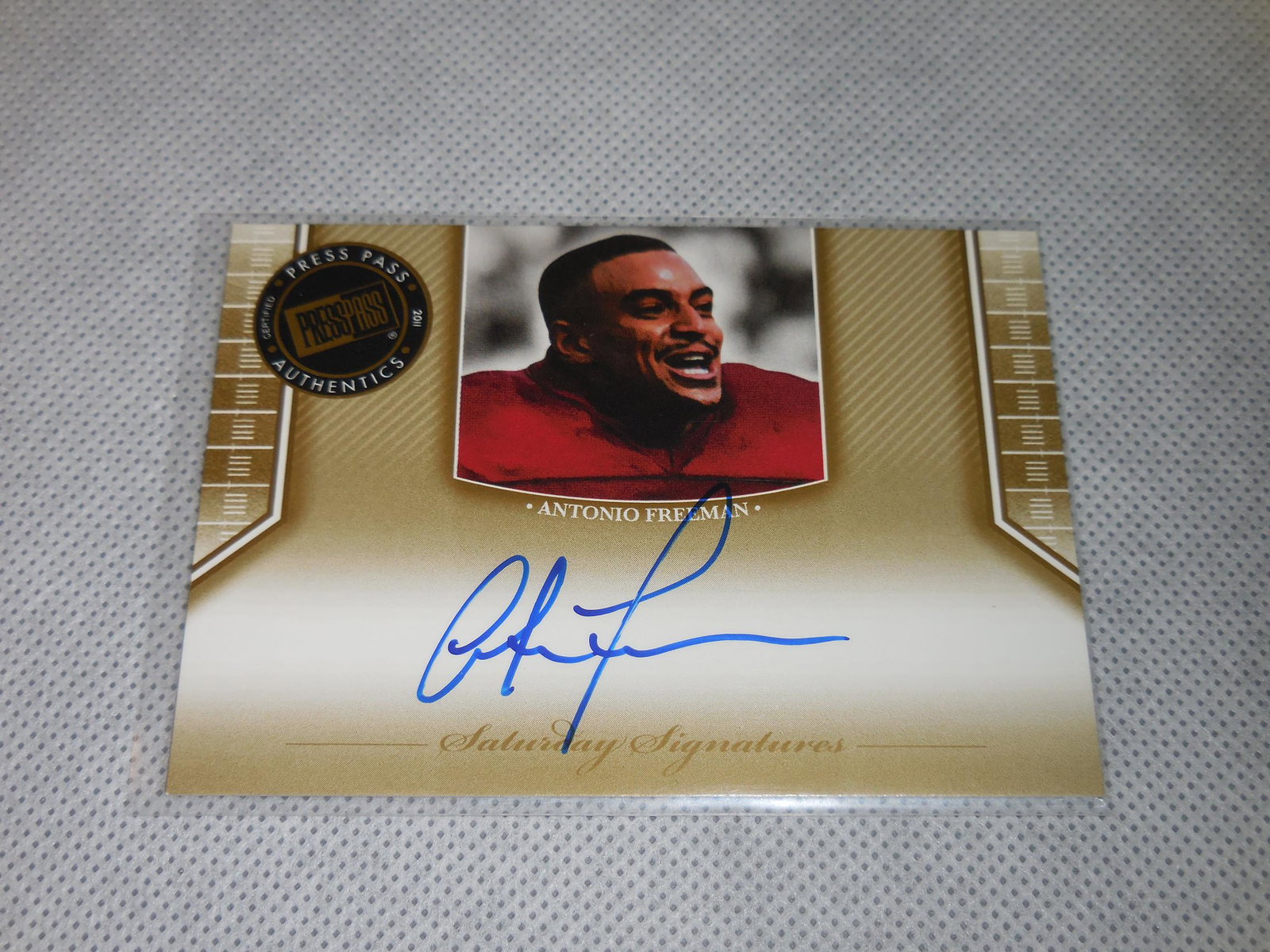 2011 PRESS PASS ANTONIO FREEMAN AUTOGRAPH: A VERY NICE CARD FOR ANY COLLECTOR! PLEASE SEE PHOTOS TO DETERMINE THE EXACT CONDITION OF THIS CARD BUT IN MY OPINION IT IS APPROXIMATELY NEAR MINT CONDITION OR BETTER. THE ACTUAL CARD IN THE PHOTOS I