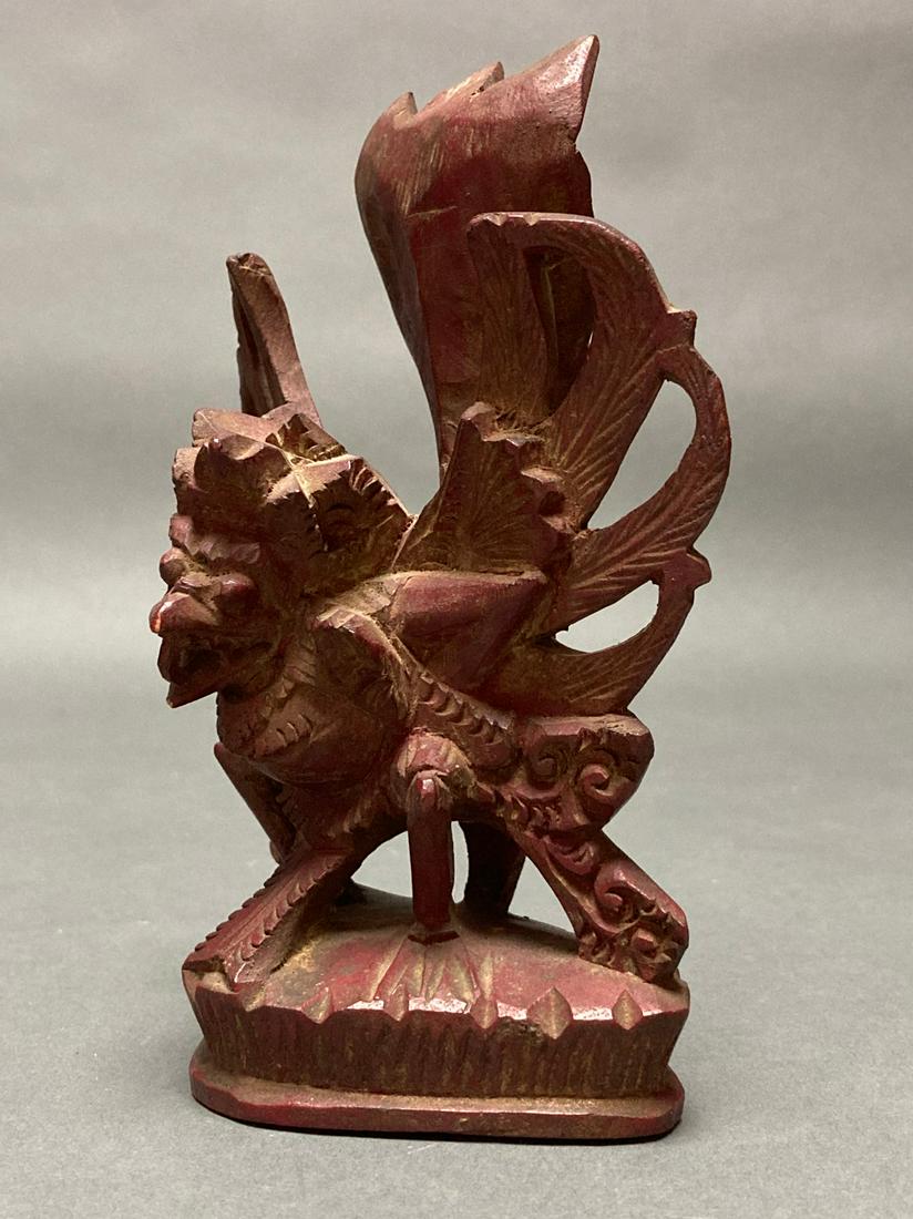 Wooden Garuda figure - Indonesia: Wooden Garuda figure with gold lacquer remnants and collection number. Old wooden Garuda figure from Dutch private collection. There are traces of gold lacquer in various places. At the bottom a colle