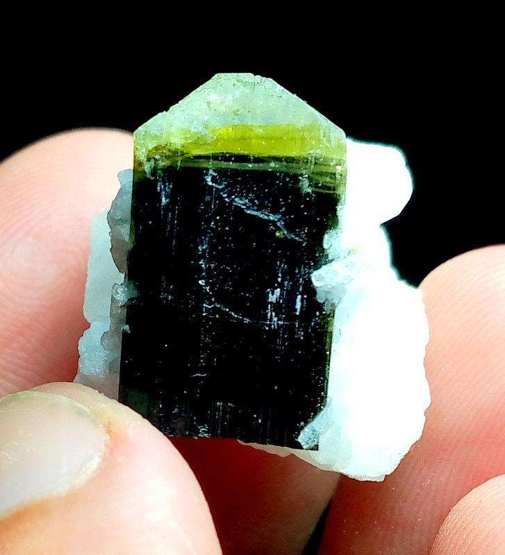 12 Grams Beautiful Green Cap Tourmaline With Albite: 12 Grams Beautiful Green Cap Tourmaline With Albite Specimen From Astak Skardu pakistan SIZE 32*21*22 mm Reserve: $20.00 Shipping: Domestic: Flat-rate of $20.00 to anywhere within the contiguous U.S. 