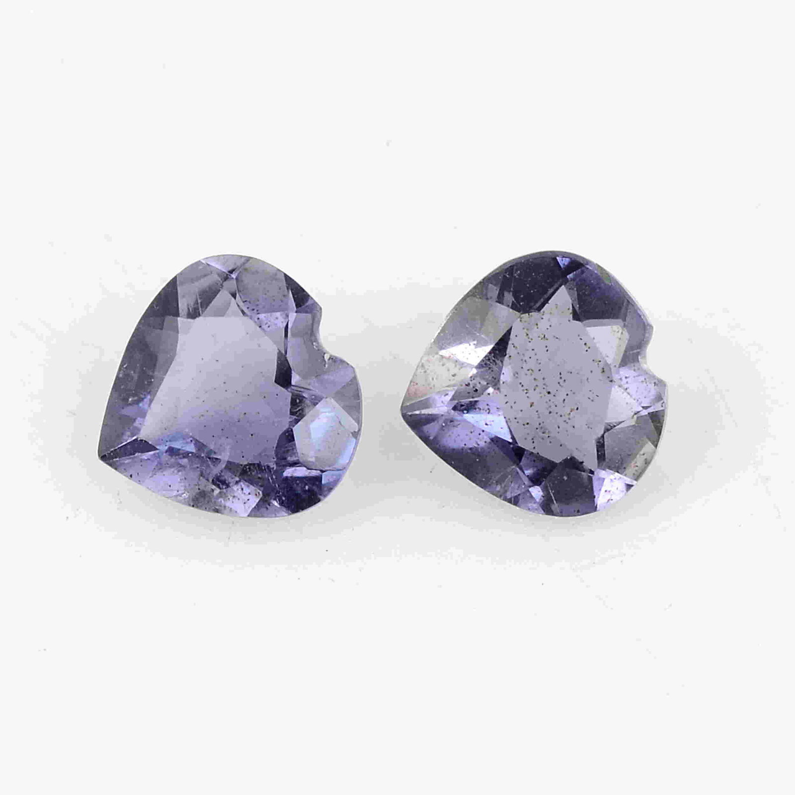 1.63 Carat Dark Blue Color Natural Heart Iolite 2: No Reserve! Title: 1.63 Carat Dark Blue Color Natural Heart Iolite 2 Pieces Gemstones: Iolite Carat Weights: 1.63 Size/Dimensions: 3.5 x 7 7 MM Shipping: Domestic: Flat-rate of $7.00 to anywhere withi