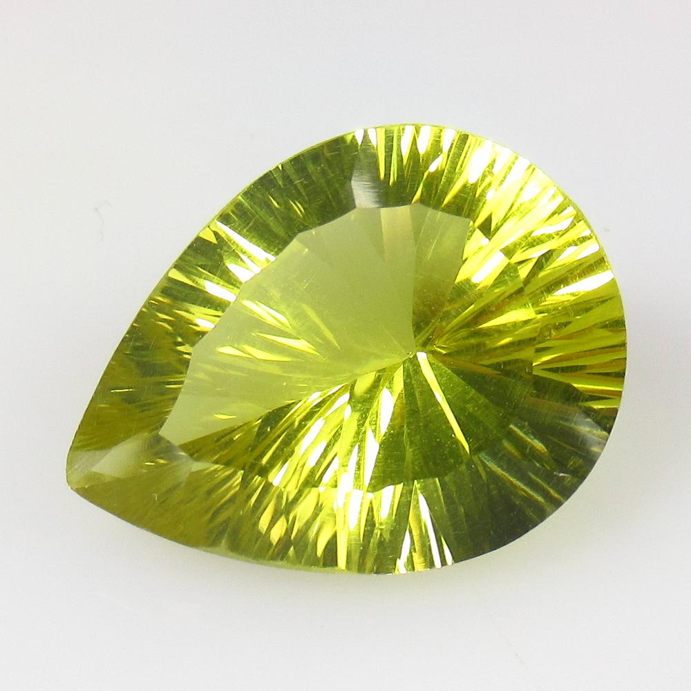 13.80 Ct Natural Lemon Quartz Concave Cut: No Reserve! Title: 13.80 Ct Natural Lemon Quartz Concave Cut Stone Clarity: VVS Gemstone: Natural Lemon Quartz Carat Weight: 13.8 Size/Dimensions: 20.20 x 15.30 x 9.90 mm Additional Information: Good 