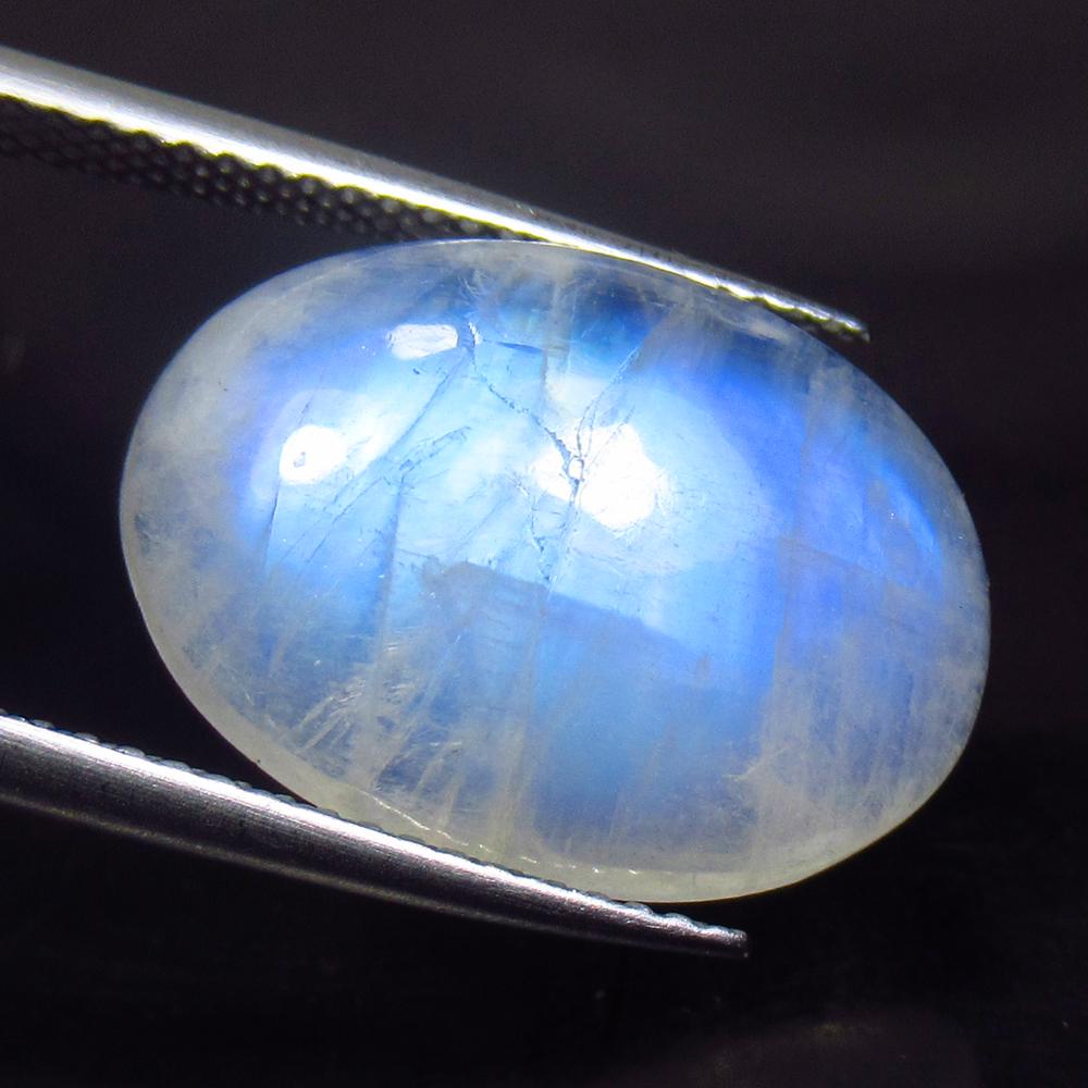 10.21 Ct Natural Blue Moonstone Oval Cab: No Reserve! Title: 10.21 Ct Natural Blue Moonstone Oval Cab Stone Clarity: Translucent Gemstone: Natural Moonstone Carat Weight: 10.21 Size/Dimensions: 18.10 x 13.00 x 5.40 mm Additional Information: