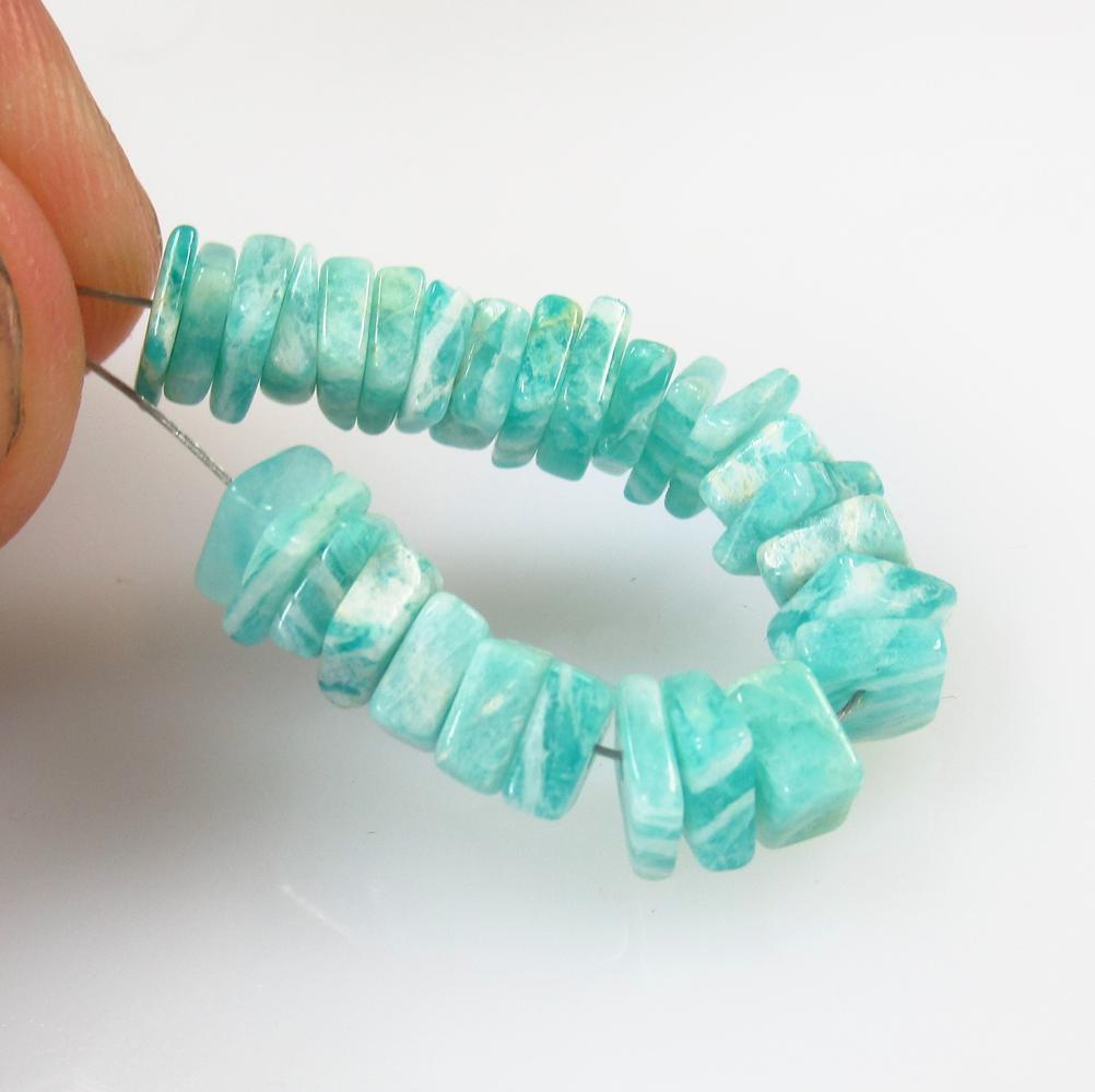 15.26 Ct Natural 33 Drilled Amazonite Square Beads: No Reserve! Title: 15.26 Ct Natural 33 Drilled Amazonite Square Beads Stone Clarity: Opaque Gemstone: Natural Amazonite Beads Carat Weight: 15.26 Size/Dimensions: 5.0x4.7 to 5.6x5.4 mm / 33 PC's Addit
