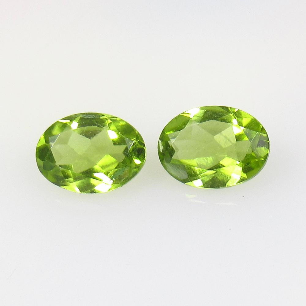 2.50 Ct Natural Pakistan Peridot Oval Pair: No Reserve! Title: 2.50 Ct Natural Pakistan Peridot Oval Pair Stone Clarity: VVS Gemstone: Natural Peridot Carat Weight: 2.50 Size/Dimensions: 8.10 x 6.10 x 3.40 mm / 2 PC's Additional Information: To