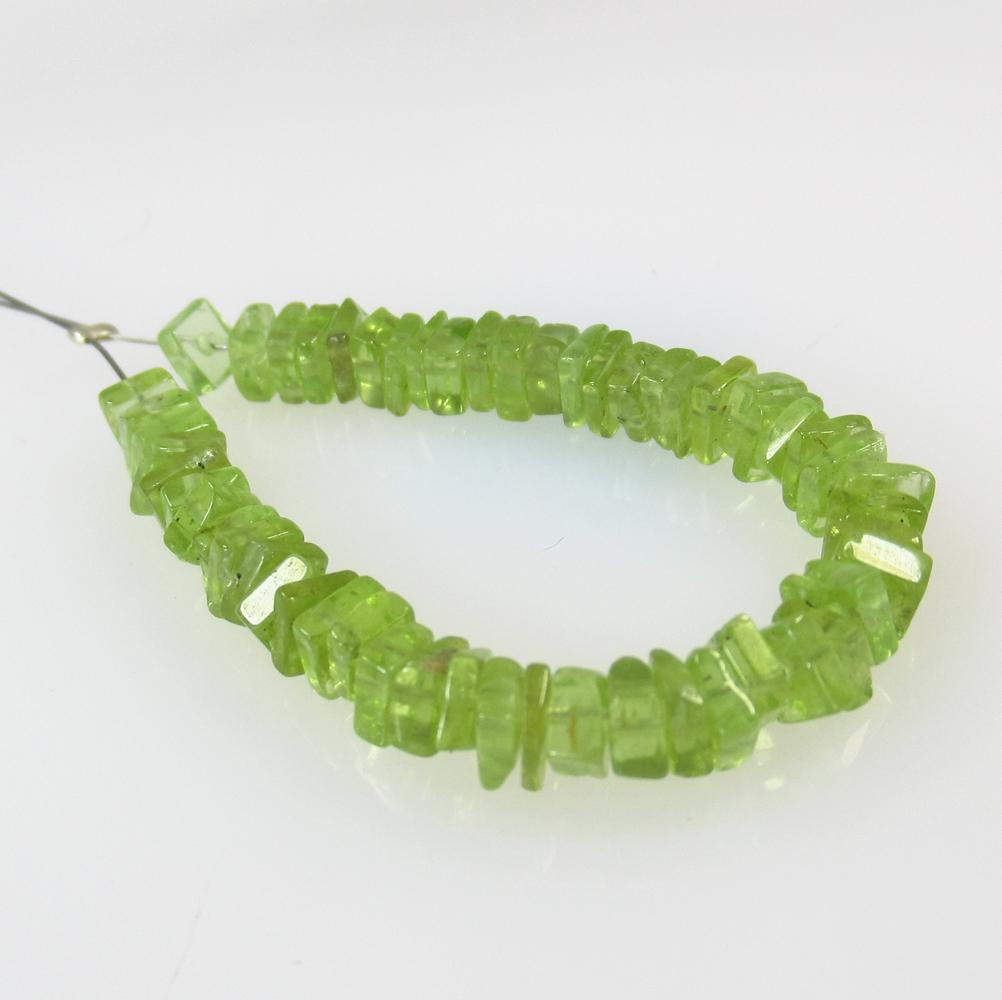 16.83 Ct Natural 59 Pakistan Peridot Drilled Square: No Reserve! Title: 16.83 Ct Natural 59 Pakistan Peridot Drilled Square Beads Stone Clarity: Transparent Gemstone: Natural Peridot Beads Carat Weight: 16.83 Size/Dimensions: 3.9x3.8 to 4.2x4.0 mm / 59 