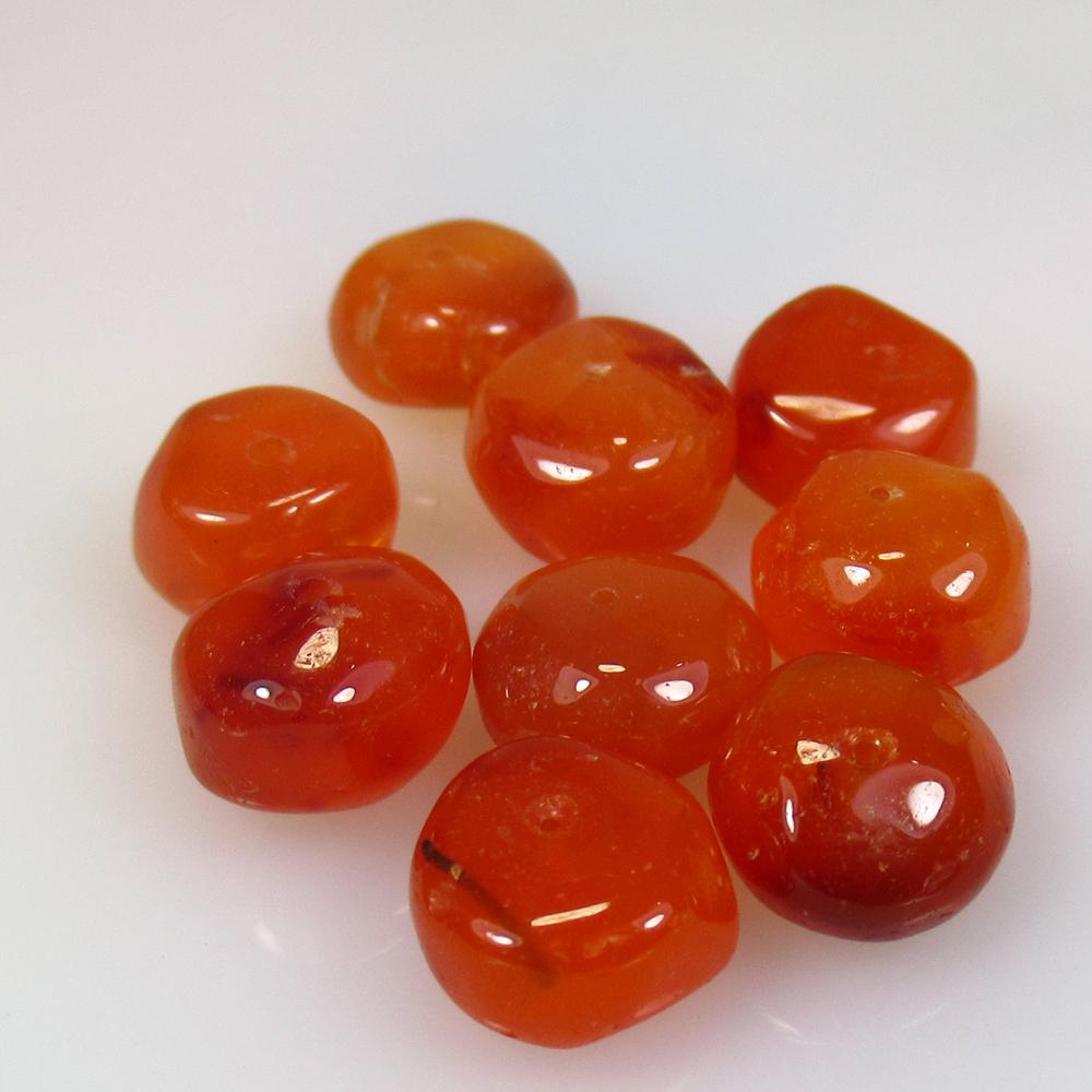 25.55 Ct Natural 9 Orange Carnelian Round Beads: No Reserve! Title: 25.55 Ct Natural 9 Orange Carnelian Round Beads Stone Clarity: Semi-Transparent Gemstone: Natural Carnelian Beads Carat Weight: 25.55 Size/Dimensions: 8.10 to 8.70 mm / 9 PC's Addit