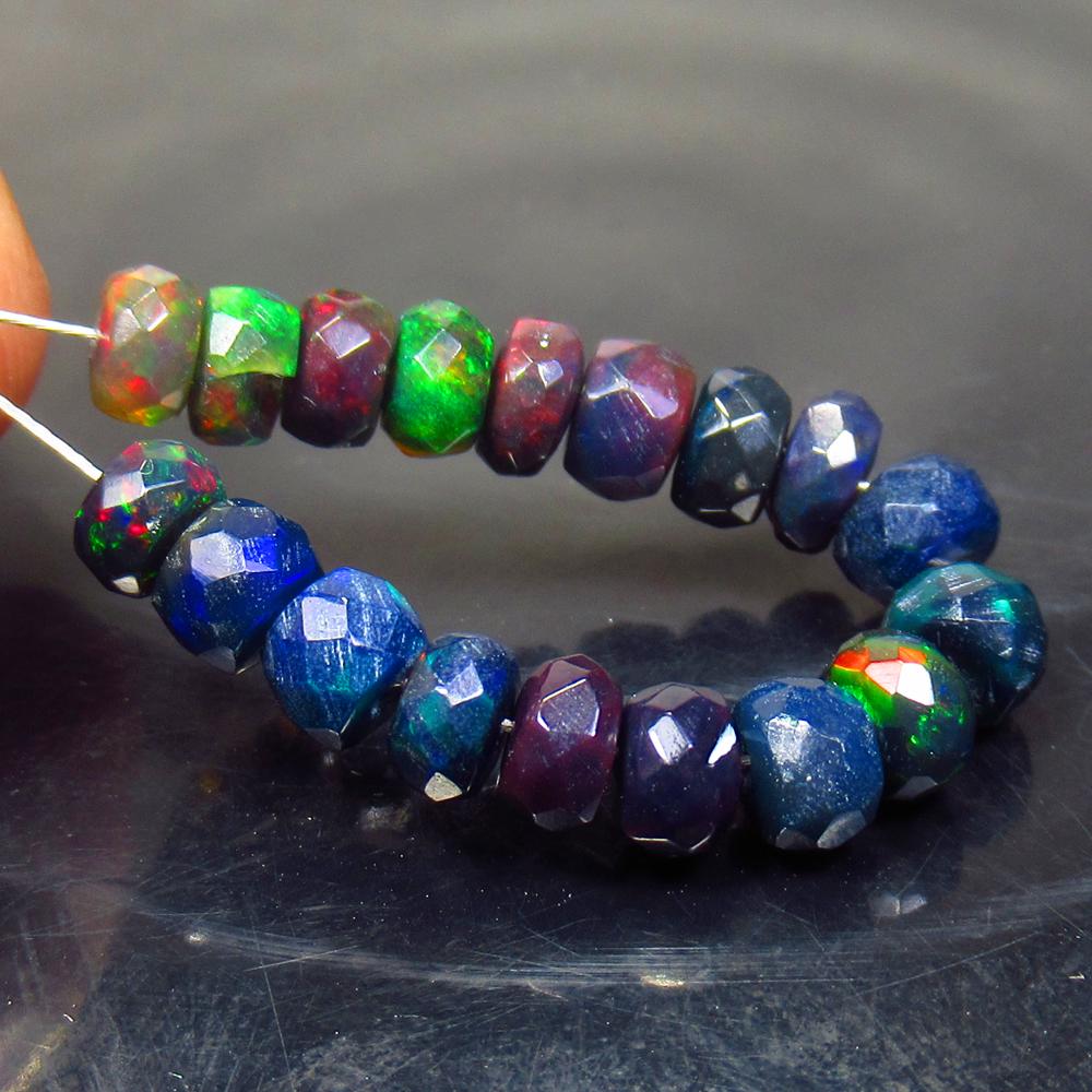 6.61 Ct Natural 18 Drilled Black Faceted Fire Opal: No Reserve! Title: 6.61 Ct Natural 18 Drilled Black Faceted Fire Opal Beads Stone Clarity: Translucent Gemstone: Natural Faceted BlackOpal Beads Carat Weight: 6.61 Size/Dimensions: 4.50 to 5.00 mm / 1